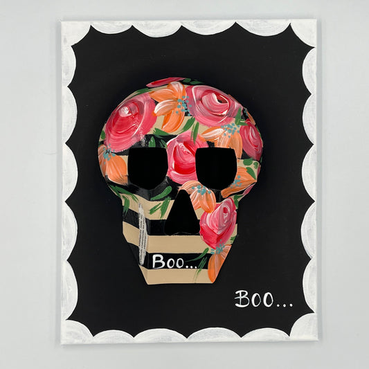Skull and bloom motif in retro-inspired wall art frame